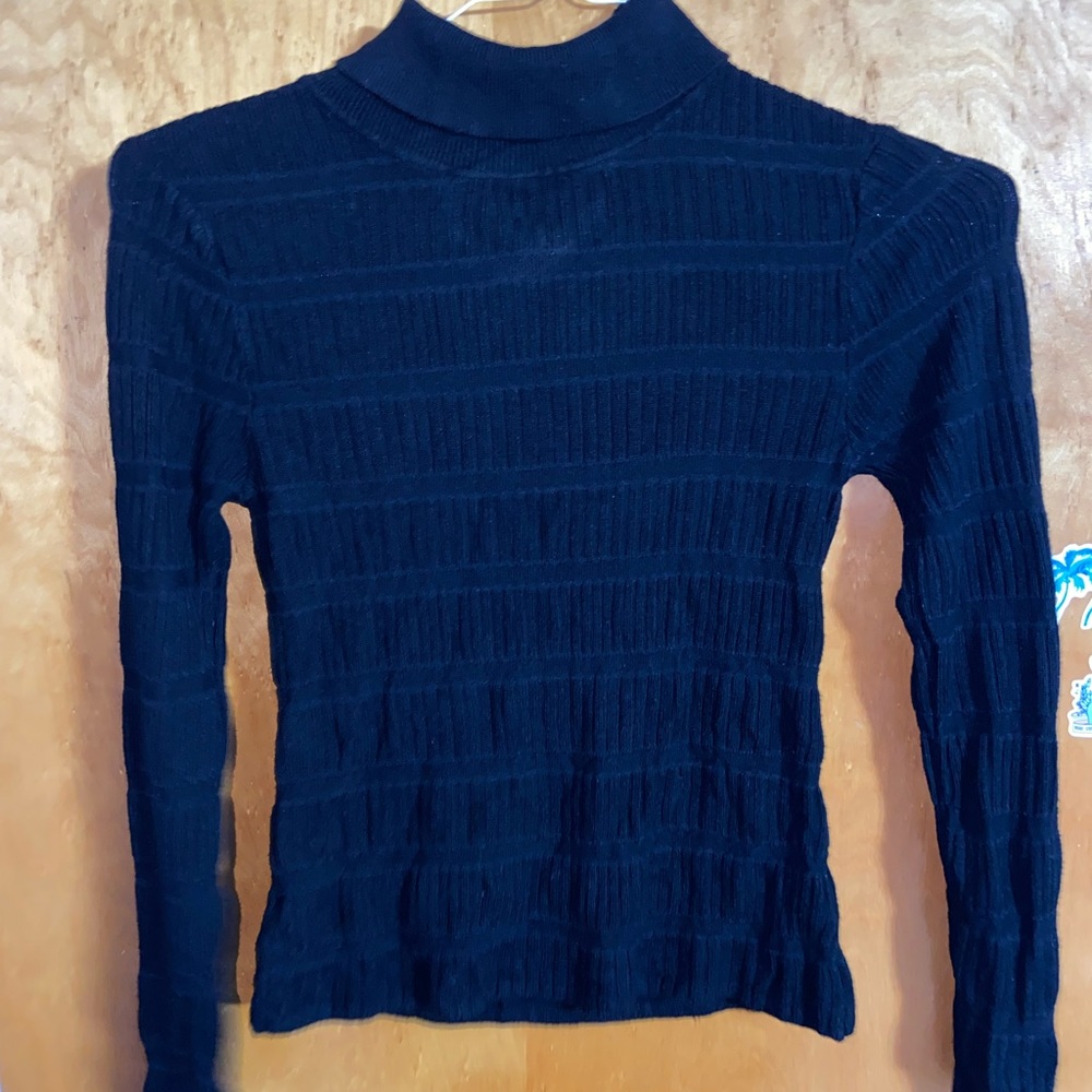 Black turtle neck sweater